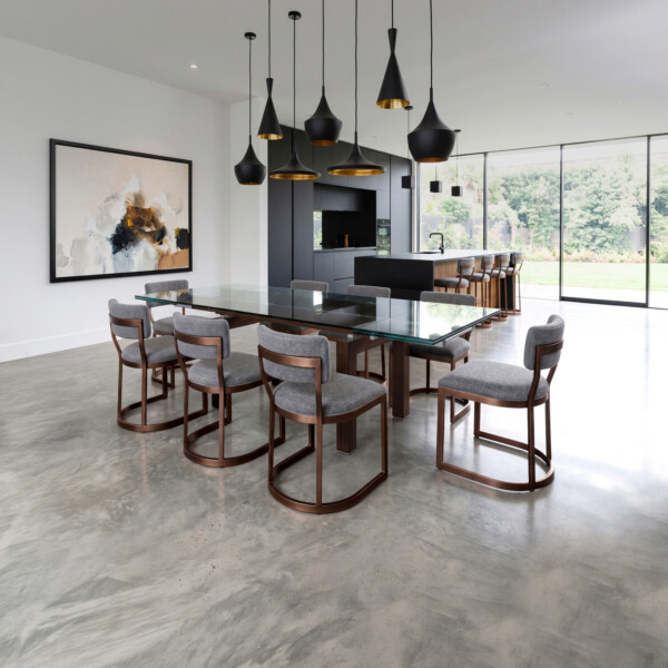 Wesley Allen Olin dining chairs around a glass table
