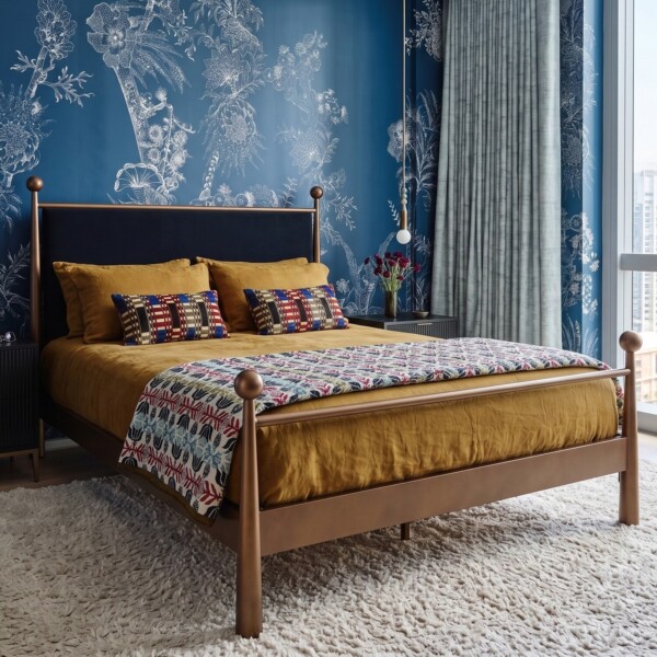 Wesley Allen Olympus iron bed in a bedroom setting